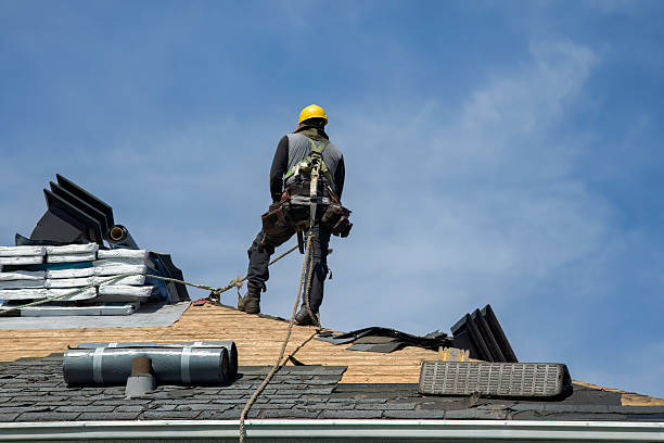 Professional Roof Replacement technician working in Topeka, IN